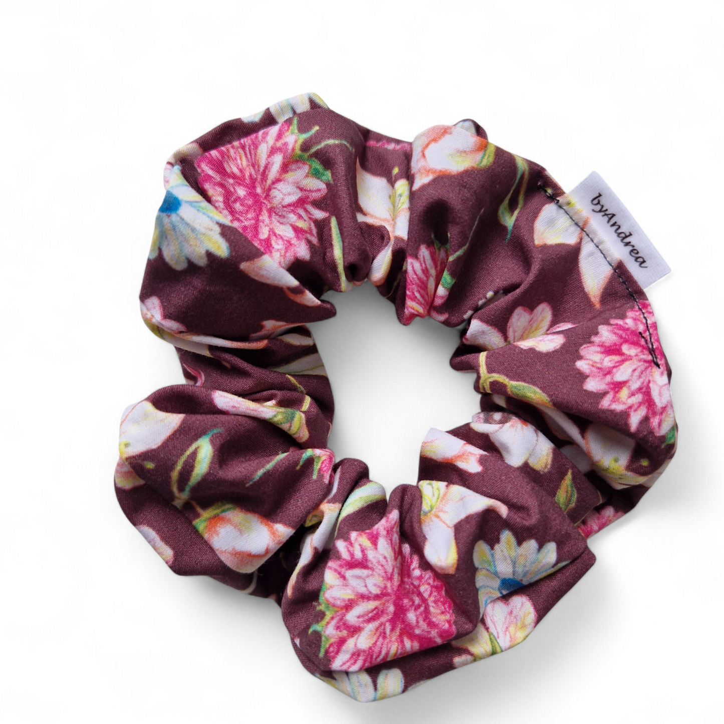 Scrunchie store blomster på vinrød bakgrunn
